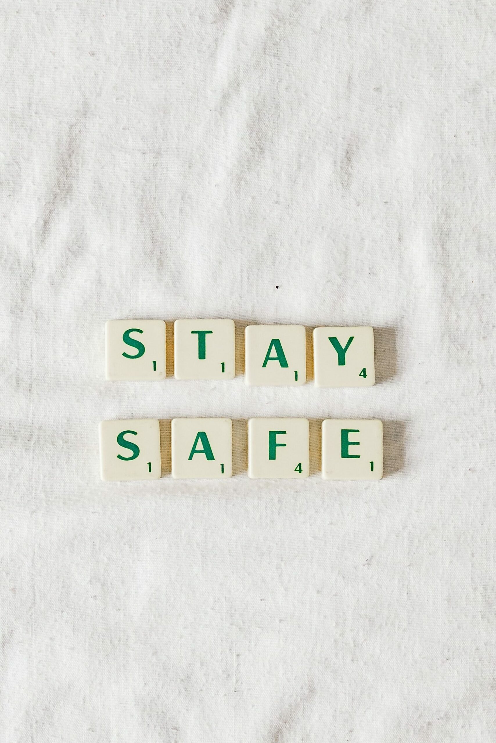 image says "stay safe" written with crossword blocks.