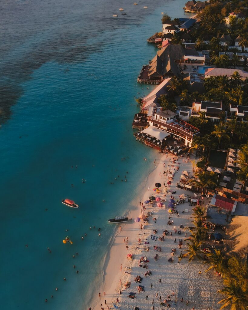 Birds eye view looking down on a crowed beach in zanzibar 